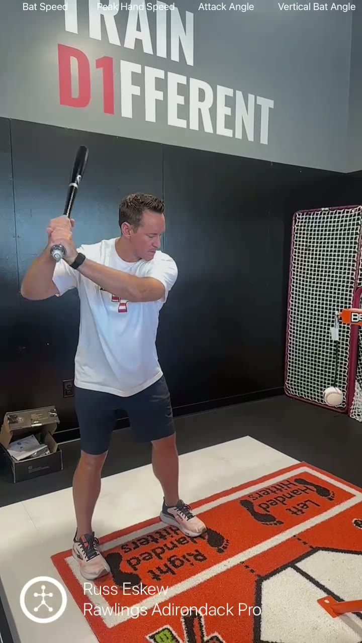 Athlete hitting on a Beast Hack station at D1 Training in Mesa, Arizona with Blast Motion swing data